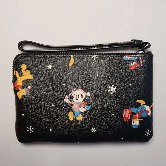 NWT Coach CN031 Disney Corner Zip Wristlet Holiday Minnie Mickey Daffy Pluto - Picture 2 of 3